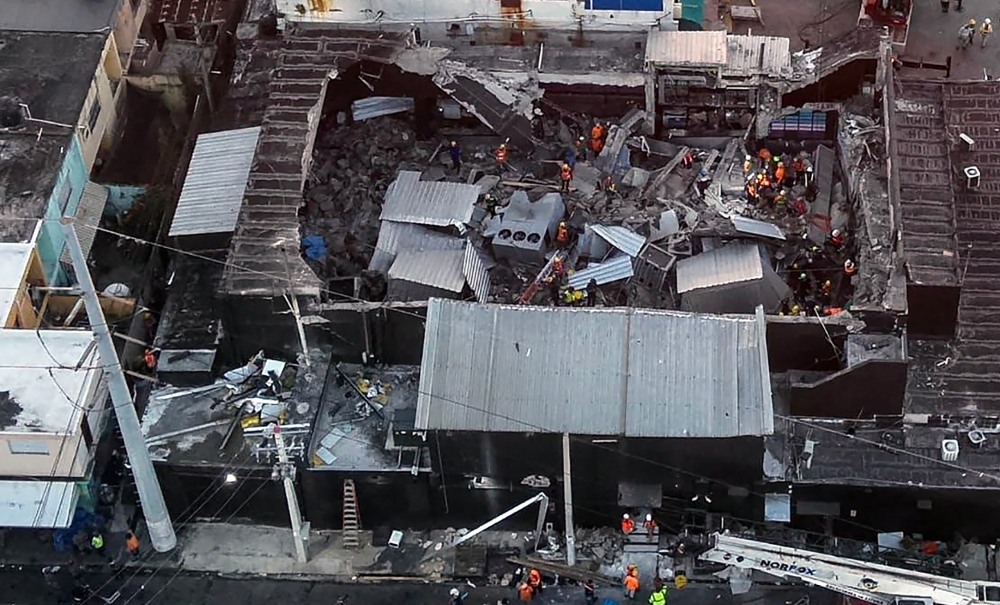 Handout picture released by Prensa Servicio 911 showing an aerial view of the Jet Set nightclub after the collapse of its roof, in Santo Domingo, on April 8, 2025. — Prensa Servicio 911 handout/AFP pic