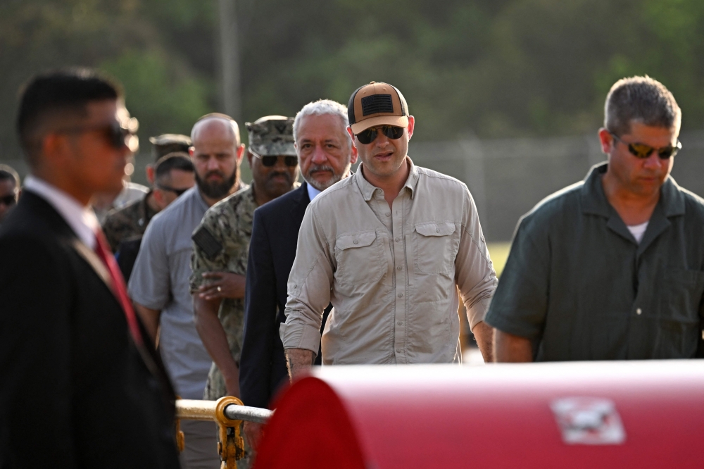 US Secretary of Defense Pete Hegseth (2nd right) visits the Miraflores locks of the Panama Canal accompanied by Panama Canal Administrator Ricaurte Vasquez (3rd right) in Panama City April 8, 2025. — AFP pic