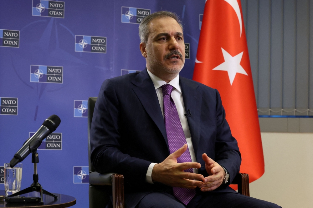 Turkish Foreign Minister Hakan Fidan attends an interview with Reuters, in Brussels, Belgium April 4. — Reuters pic