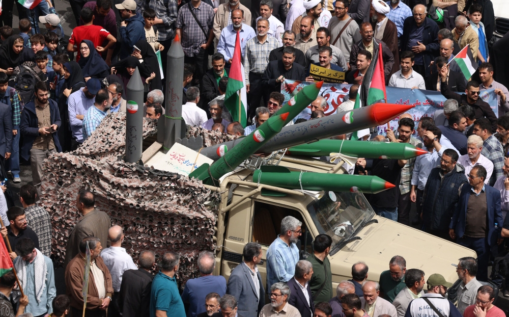 Iranian protesters attend a rally in Terhan's Palestine Square on April 9, 2025. — AFP pic