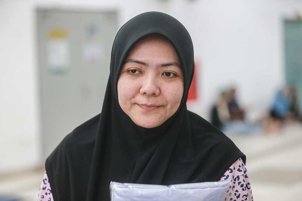 Hasrina Nordin is vowing to seek justice for her family and neighbours. — Picture by Sayuti Nordin