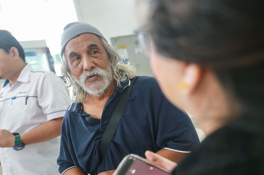 Nasir Hamid recalles the deafening blast that turned decades of memories into ash.  — Picture by Sayuti Nordin