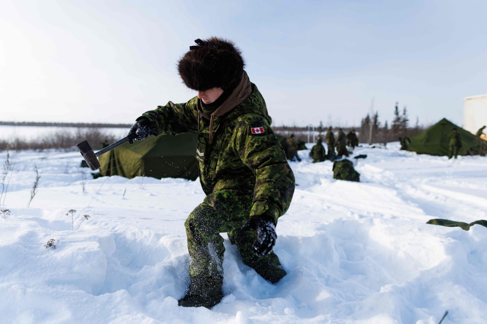 Canadian soldiers with the 5th Canadian Division set up camp during Operation Nanook, the Canadian Armed Forces' annual Arctic training and sovereignty operation, in Inuvik, Northwest Territories, Canada, March 2, 2025. — AFP pic