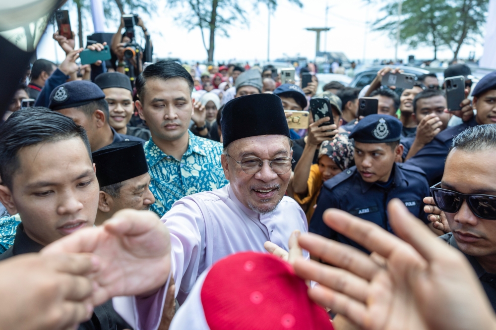 Prime Minister Datuk Seri Anwar Ibrahim at the state-level Aidilfitri Madani 2025 event at Pantai Irama. — Bernama pic