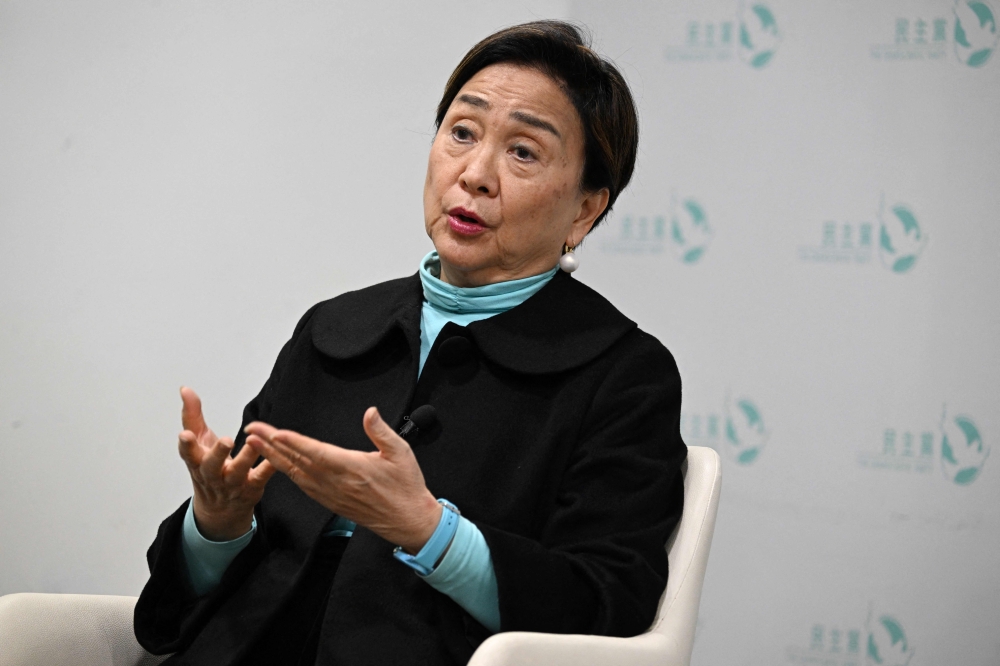 Emily Lau (pictured)  is the former chair of the Democratic Party, once the city’s stalwart opposition force but now seatless and preparing to dissolve as some of its veterans languish in jail. — AFP pic