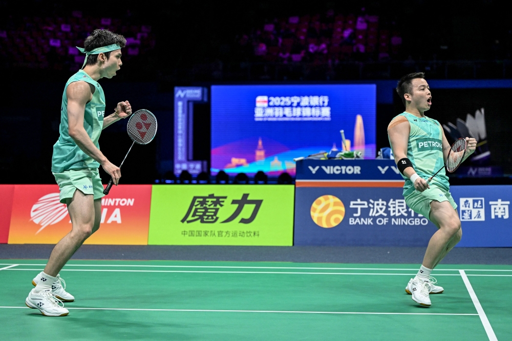 The world No. 6 pair defeated China’s Chen Bo Yang and Liu Yi 21-19, 21-17 in Ningbo today. — AFP pic