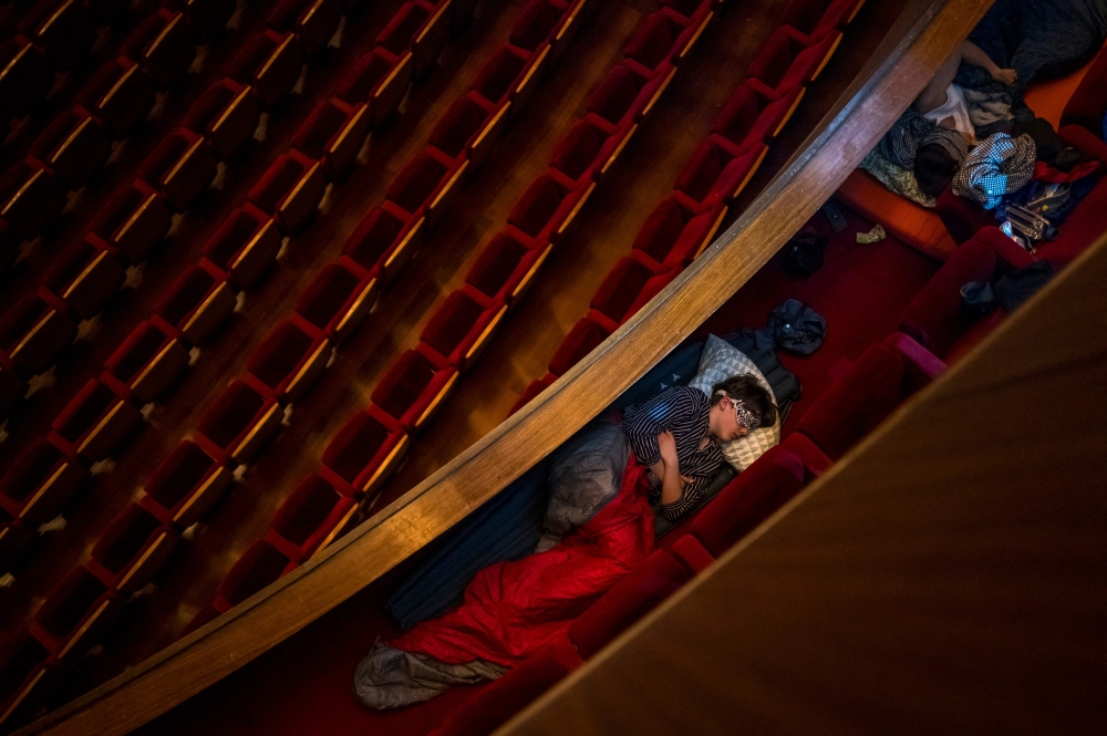 Children are sleeping in a opera box, during an opera sleepover event at the Grand Theatre in Geneva on April 5, 2025. — AFP pic