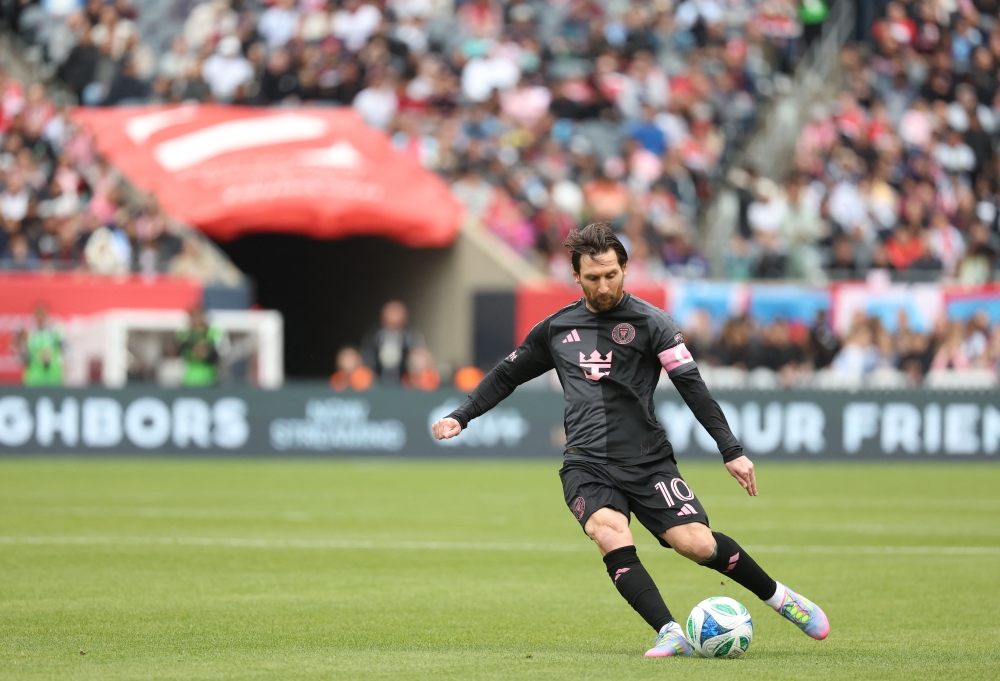 Inter Miami CF forward Lionel Messi kicks a ball downfield during the first half against Chicago Fire FC at Soldier Field in Chicago, April 13, 2025. — Talia Sprague-Imagn Images pic via Reuters 