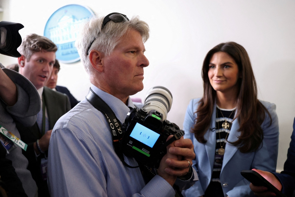 Associated Press photographer Alex Brandon waits in the White House briefing room moments before being told that he and the AP reporter will not be allowed to join the press pool covering the Oval Office meeting between US President Donald Trump and El Salvador President Nayib Bukele, in Washington DC, April 14, 2025. — Reuters pic 