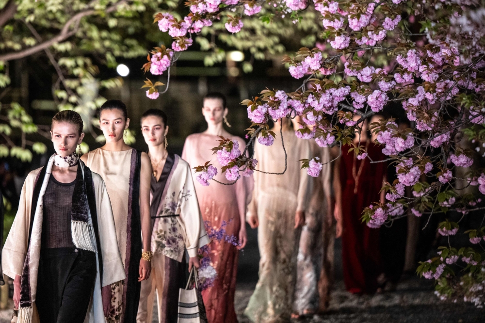 Dior creative director Maria Grazia Chiuri showed her fall fashion collection of loose, minimalist styles in the garden of the Toji Temple in Kyoto. — AFP pic