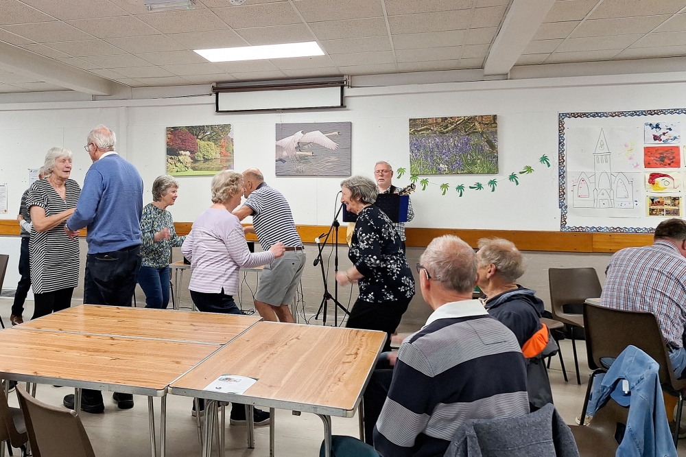 Participants have fun and dance during a Dementia Cafe session at St Ives, Cambridgeshire, UK. — Picture by Ida Lim