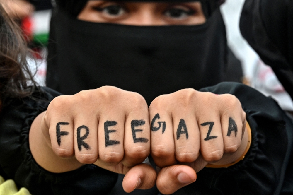 A Jamaat-e-Islami (JI) party supporter in solidarity with Palestinians takes part in an anti-Israel protest in Karachi on April 13, 2025, amid the ongoing war between Israel and the militant group Hamas. — AFP pic