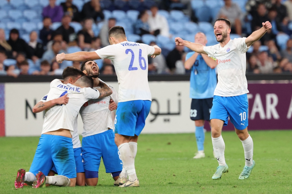 Lion City Sailors players celebrate their qualification for the final after the AFC Champions League Two semi-final second leg football match with Sydney FC of Australia at Allianz Stadium in Sydney on April 16, 2025. — AFP pic