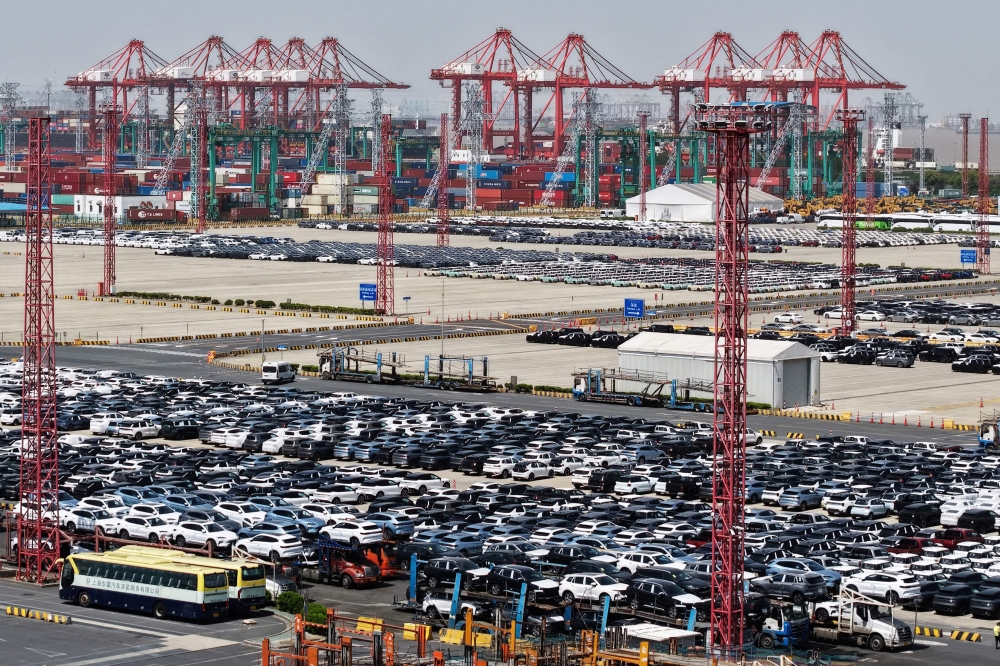 Chinese made cars for export are seen at a port in Shanghai on April 17, 2025. — AFP pic
