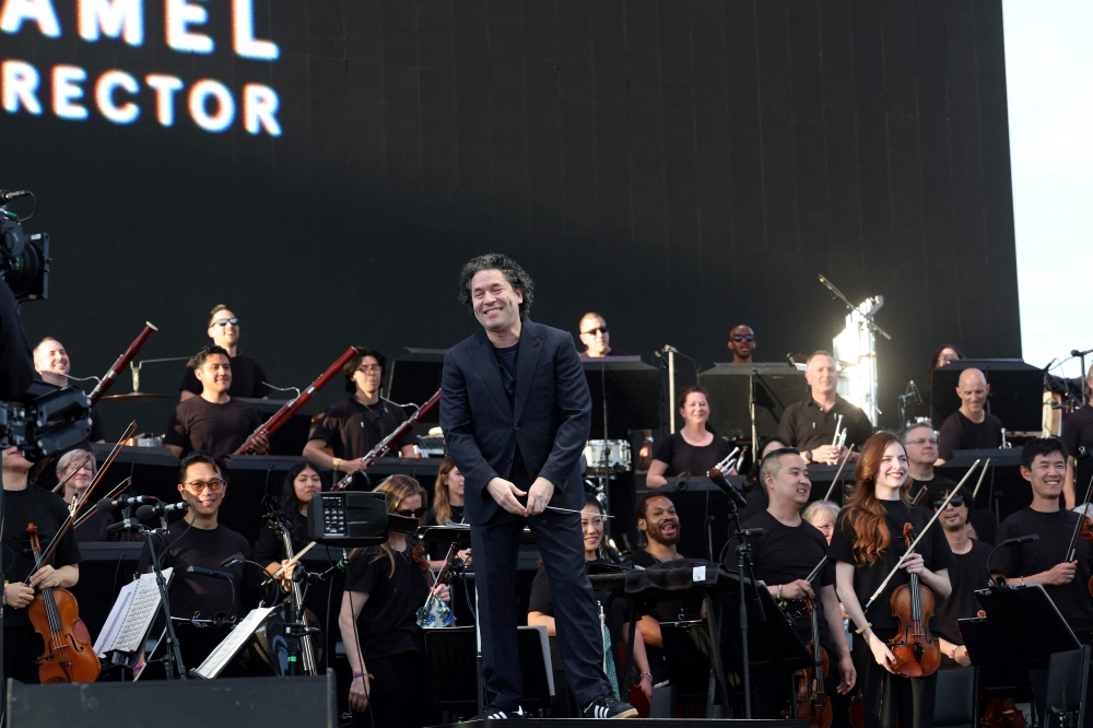 Venezuelan conductor Gustavo Dudamel and the Los Angeles Philarmonic perform on stage during the 2025 Coachella Valley Music and Arts Festival at Empire Polo Club on April 12, 2025 in Indio, California. Under Dudamel's direction for the past 17 years, the LA Phil has cultivated an air of cool, fostering a relationship with pop and celebrity especially during summer series at the Hollywood Bowl. And in the meantime the conductor has grown into a bonafide celebrity himself. So it was perhaps only natural that the 44-year-old take his act to California's Coachella, one of the world's highest-profile music festivals that's in recent years gained a reputation for buzzy surprises and eclectic line-ups. — AFP pic