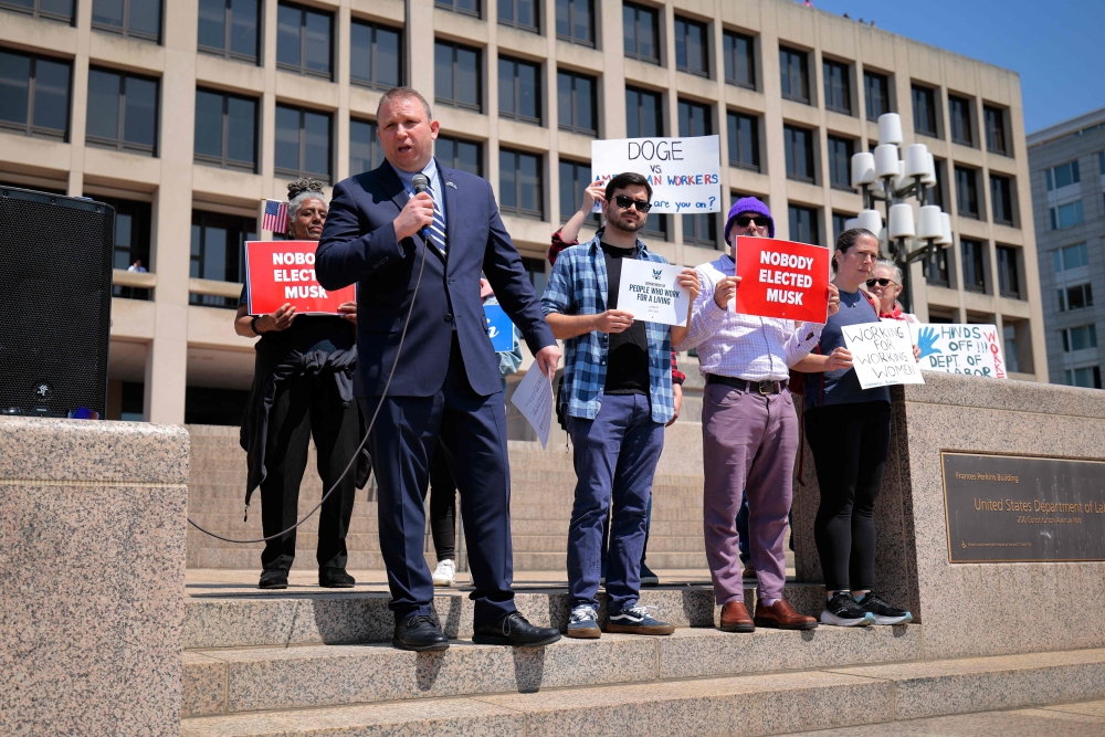 National Federation of Federal Employees (NFFE) National President Randy Erwin addresses a press conference outside the Department of Labor headquarters on April 14, 2025 in Washington, DC. — AFP pic