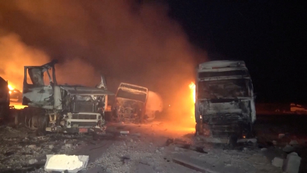 Fire and smoke rise next to charred vehicles following, what Al Masirah TV said, was a US strike on the Ras Isa fuel port, Yemen, in this screengrab from a handout video released on April 18, 2025. — Al-Masirah TV handout video screengrab via Reuters 