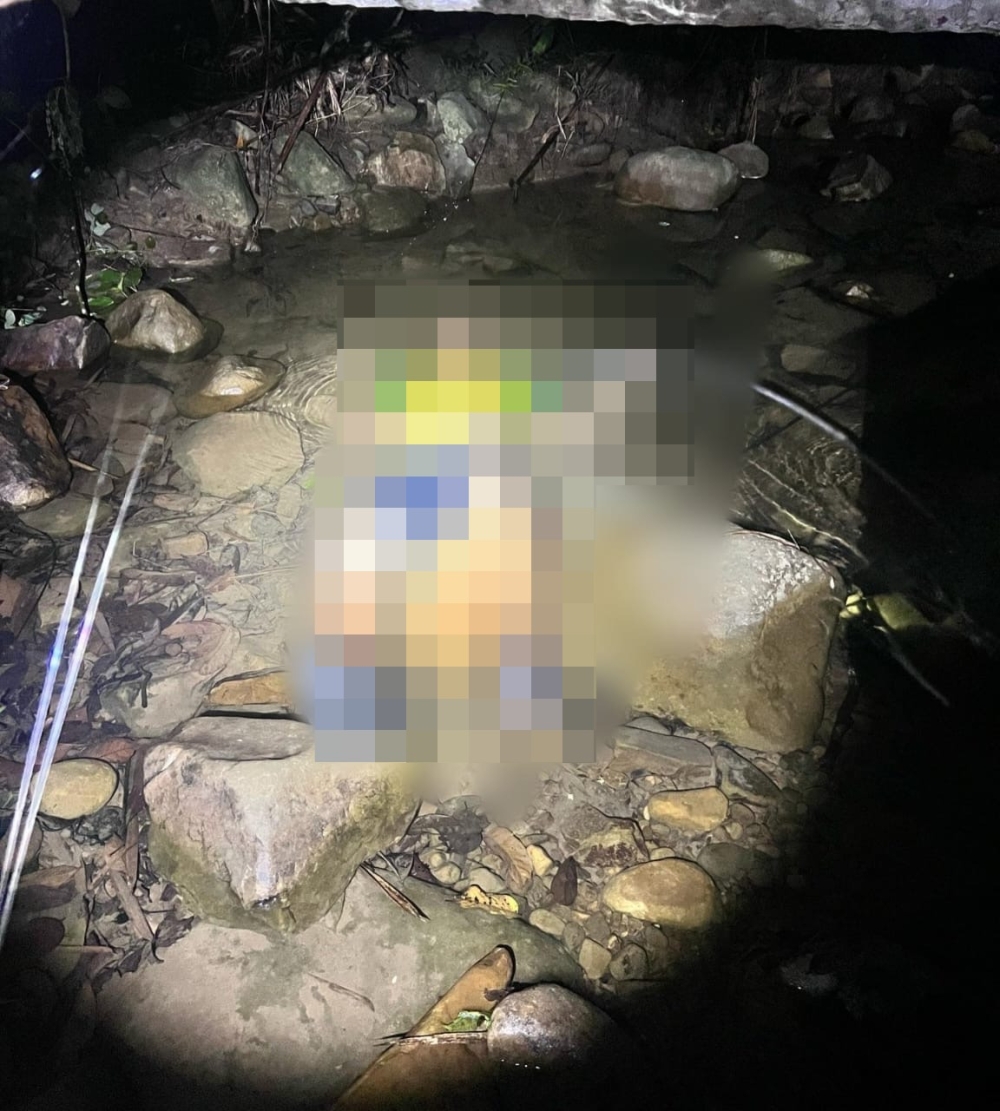 The victim electrocuted in a river at Kampung Minansad in Kota Marudu. — Picture courtesy of the police