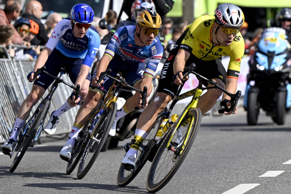 British Peter Joseph Blackmore of Israel-Premier Tech, Belgian Remco Evenepoel of Soudal Quick-Step and Belgian Wout van Aert of Team Visma-Lease a Bike compete during the men's 'Brabantse Pijl' one day cycling race, 162,5km from Huizingen, Beersel to Overijse on April 18, 2025. — AFP pic