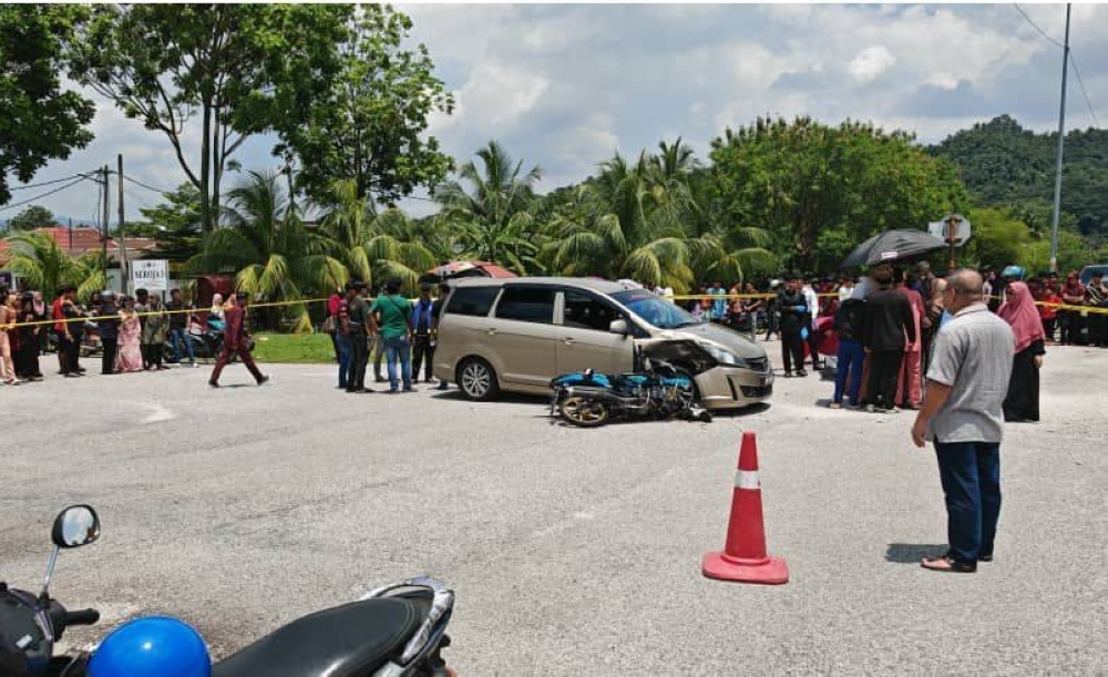 A crowd gathers at the scene of a fatal accident in Taman Seroja on April 18, 2025. — Picture courtesy of the Royal Malaysia Police
