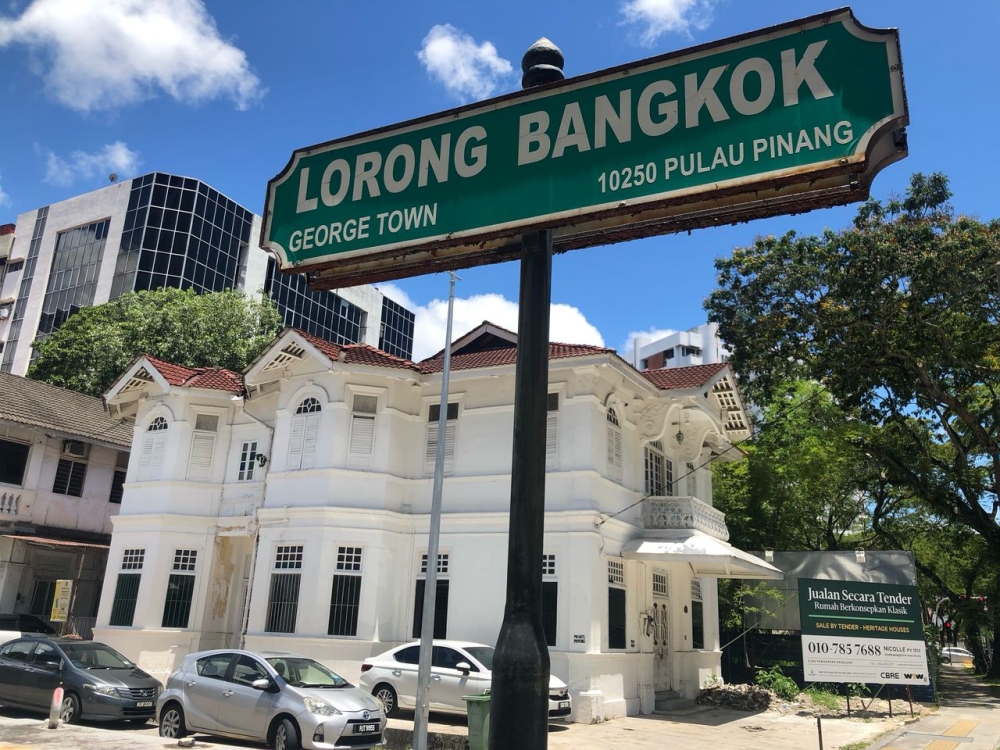 Straits-electric houses on Bangkok Lane in Pulau Tikus built in 1928 by Penang tycoon Cheah Leong Keah, are up for sale with the tender closing on May 9, 2025. — Picture by Debra Chong
