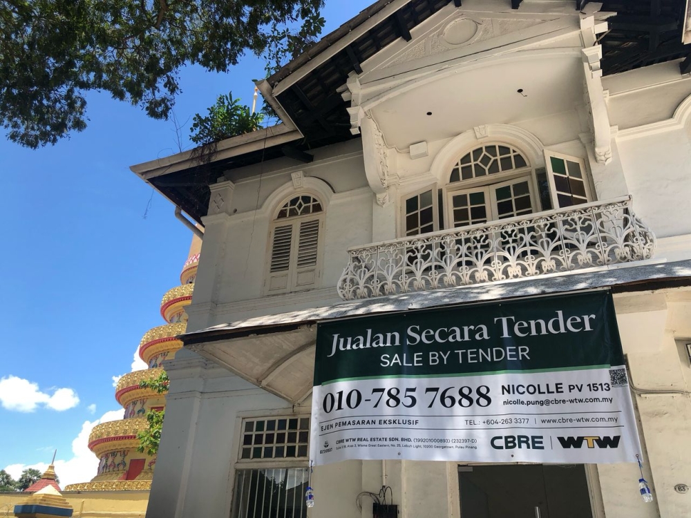 A Straits-electric house at the corner of Bangkok Lane and Kelawai Road in Pulau Tikus built in 1928 by Penang tycoon Cheah Leong Keah, is among several properties up for sale with the tender closing on May 9, 2025. — Picture by Debra Chong