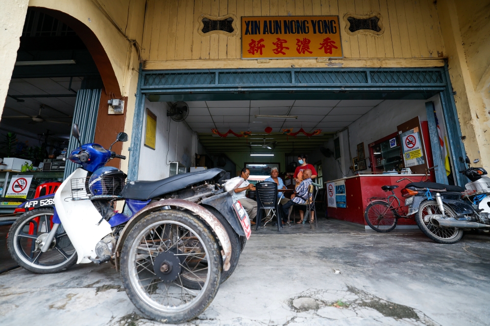 Almost a century old, Kopitiam Xin Aun Nong Yong on Tapah Road continues to be the preferred location for locals to have breakfast regardless of race and background April 20, 2025. — Bernama pic