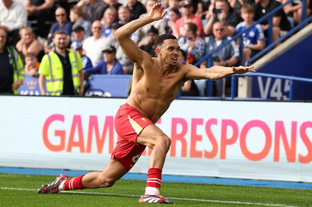 Liverpool's English defender #66 Trent Alexander-Arnold celebrates after scoring the opening goal of the English Premier League football match between Leicester City and Liverpool at King Power Stadium in Leicester April 20, 2025. — AFP pic