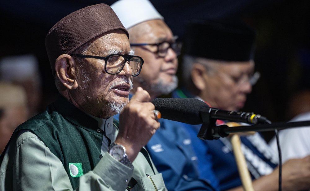 PAS president Tan Sri Abdul Hadi Awang speaks at a Perikatan Nasional campaign rally in Kampung Tanjung Keramat, Tapah, on April 19, 2025. — Bernama pic