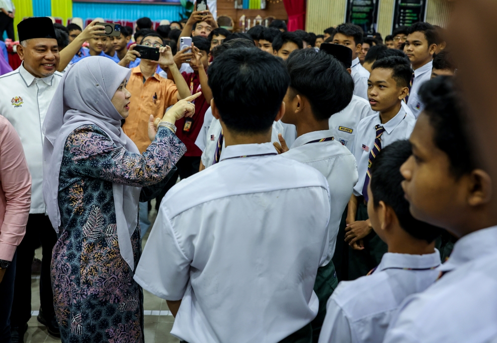 Education Minister Fadhlina Sidek engages with students at Sekolah Menengah Kebangsaan Datuk Haji Ahmad Badawi in Kepala Batas, Penang, on April 21, 2025. — Bernama pic