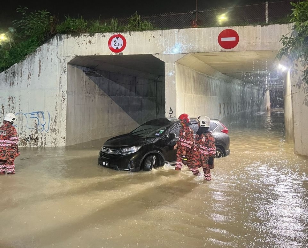 Heavy thunderstorms overnight have triggered flash floods in parts of the Klang Valley this morning. — Picture courtesy of Selangor Fire and Rescue Department