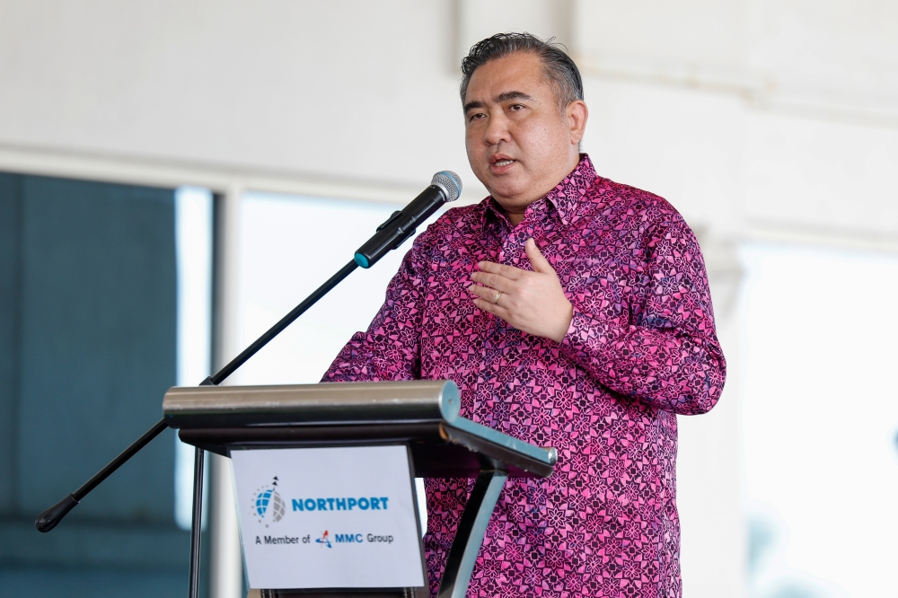 Transport Minister Anthony Loke delivers a speech at the launch of the Car Carrier Lorry Driver Training Programme for Electric Vehicle (EV) Handling at the Port Klang Cruise Terminal today. — Bernama pic