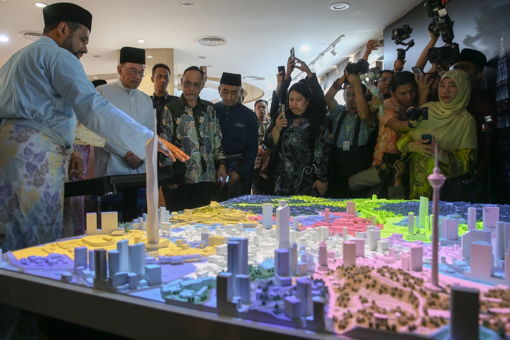 Prime Minister Datuk Seri Anwar Ibrahim visiting an exhibitions booth during the launch of the Warisan Kuala Lumpur at DBKL Tower in Kuala Lumpur April 25,2025. — Picture by Yusof Mat Isa