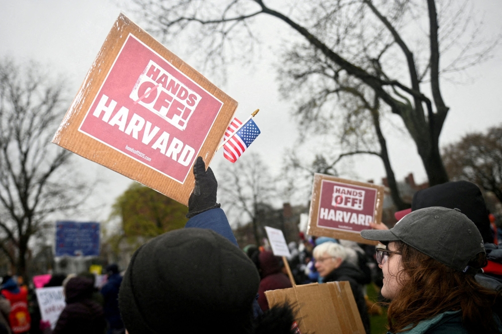 Demonstrators call on Harvard leadership to resist federal government interference at the university in Cambridge, Massachusetts. — Reuters pic