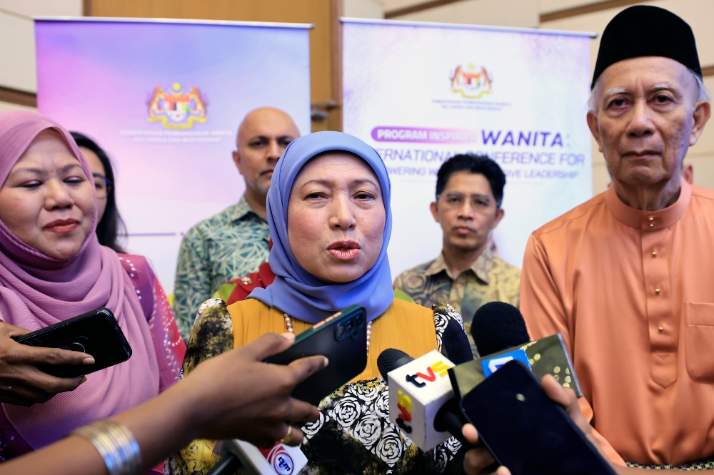 Minister of Women, Family and Community Development Datuk Seri Nancy Shukri speaks to reporters after officiating the ‘Women Inspiration Programme: International Conference for Empowering Women’s Inclusive Leadership’ today. — Bernama pic