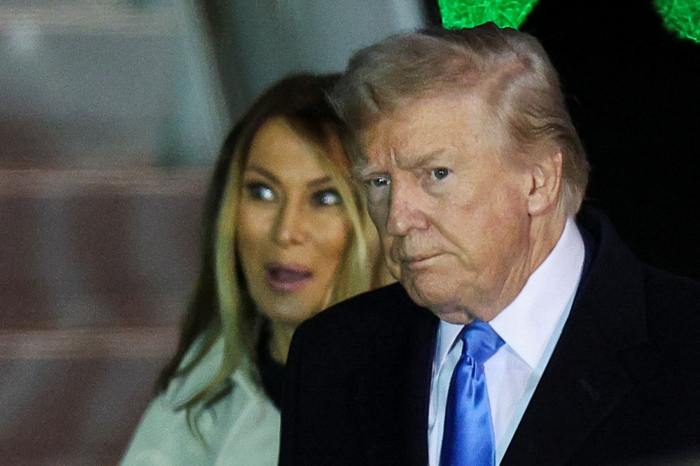 US President Donald Trump and first lady Melania Trump arrive at Fiumicino Airport, to attend the funeral of Pope Francis, near Rome, Italy, April 25, 2025. — Reuters pic