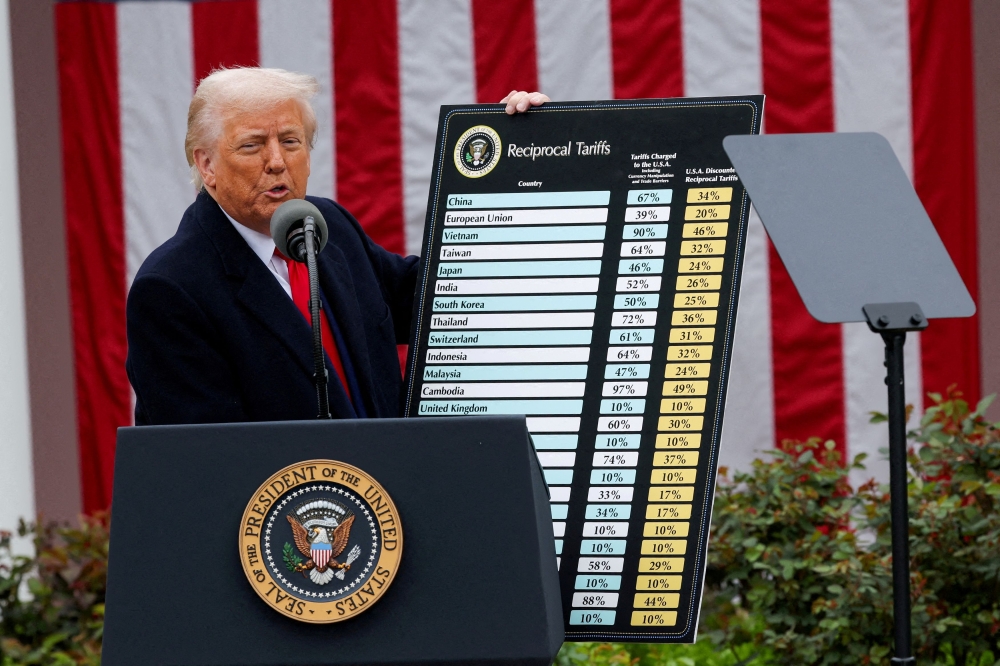 US President Donald Trump delivers remarks on tariffs in the Rose Garden at the White House in Washington, D.C. April 2, 2025. — Reuters pic  