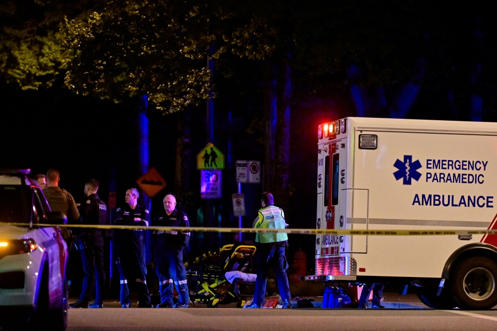 An ambulance is parked at the site of the Lapu Lapu day block party, where a vehicle drove into a crowd killing several people in Vancouver, British Columbia April 26, 2025. — Reuters pic