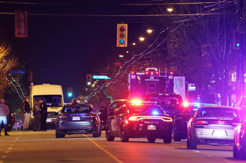 Police officers work at the scene, after a vehicle drove into a crowd at the Lapu Lapu day block party, in which police say multiple people were killed and injured, in Vancouver April 26, 2025. — Reuters pic
