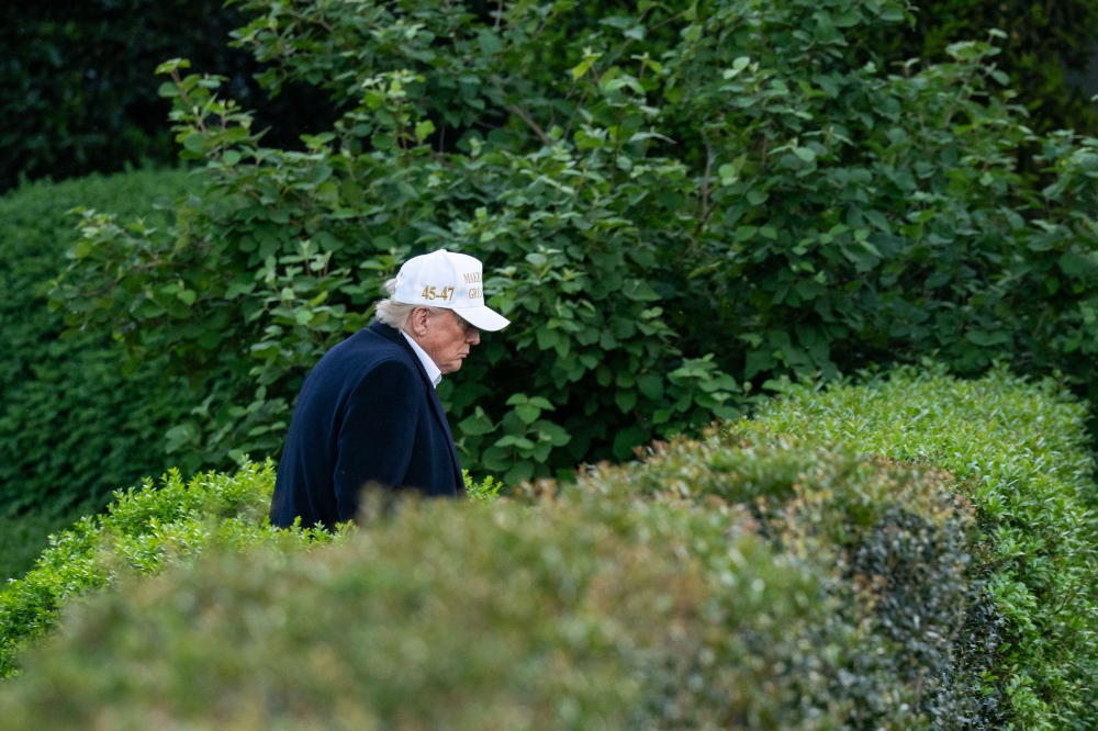 US President Donald Trump has declared that Russia President Vladimir Putin needed to 'stop shooting'. — AFP pic