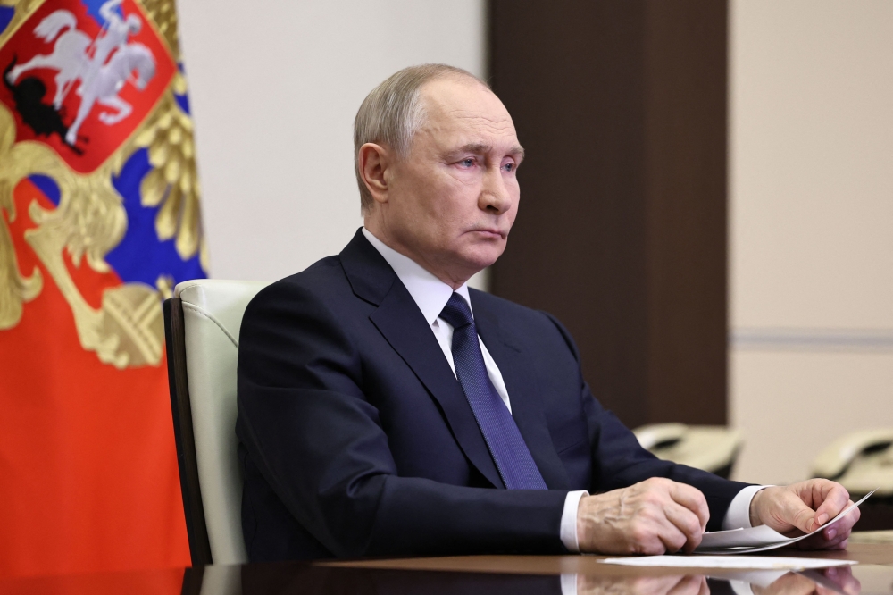 In this pool photograph distributed by Russian state agency Sputnik, Russia’s President Vladimir Putin attends a meeting with Chief of the General Staff of the Russian Armed Forces via videoconference at the Novo-Ogaryovo state residence outside Moscow on April 26, 2025. Putin has ordered a surprise three-day ceasefire from May 8-10, coinciding with Moscow’s World War II Victory Day commemorations, the Kremlin said Monday. — Sputnik handout pic via AFP 