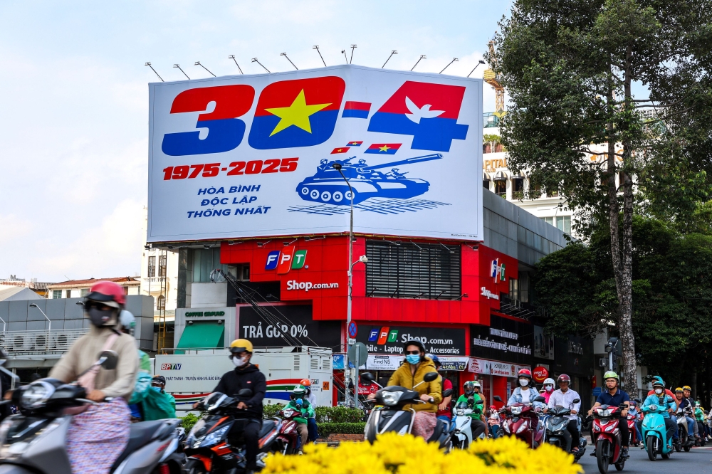 A billboard displayed ahead of the 50th Anniversary of the fall of Saigon. — Reuters pic