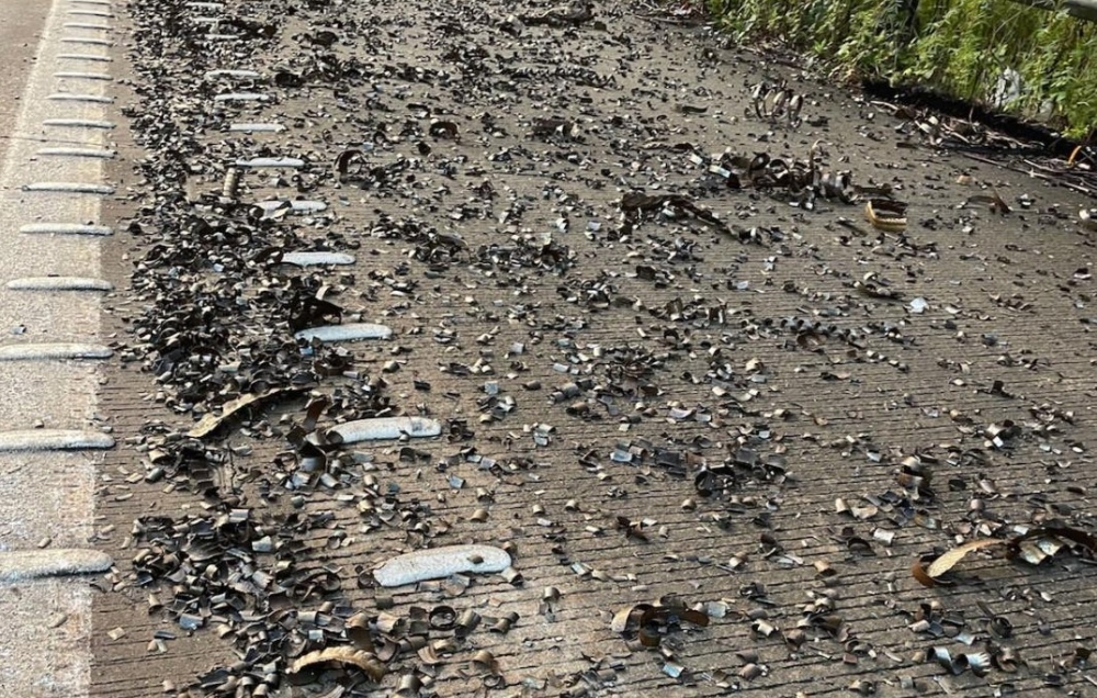 Some of the sharp metal debris covering over 30km of the M1 Pacific Motorway north of Sydney. NJ Ashton, the haulage company that owned the truck involved, apologised for the accident and said it was helping with clean-up efforts. — Picture via Facebook