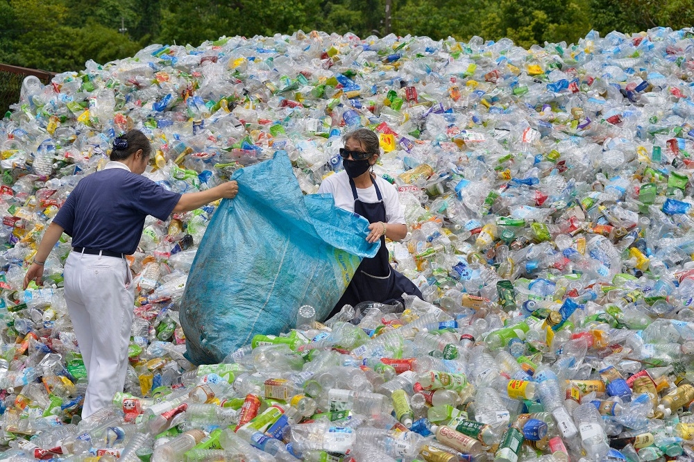 Items like aluminium cans, plastic bottles, paper, and glass can be collected, sorted, and sold to recycling centres. — AFP pic