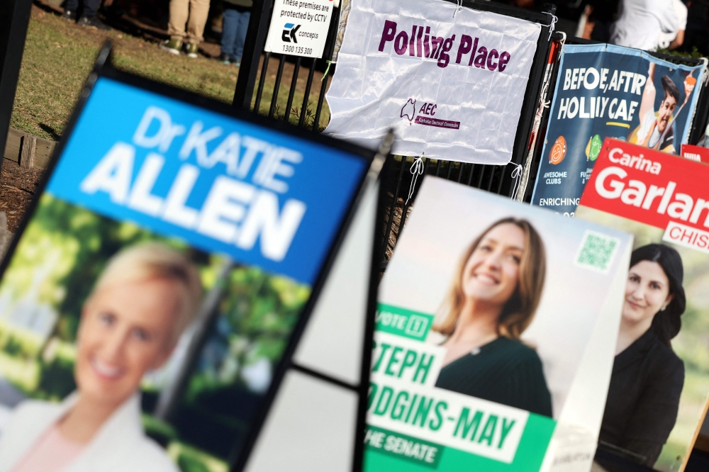 A sign displays the message 'polling place' during Australia? general election at a polling station in Melbourne May 3, 2025. — AFP pic