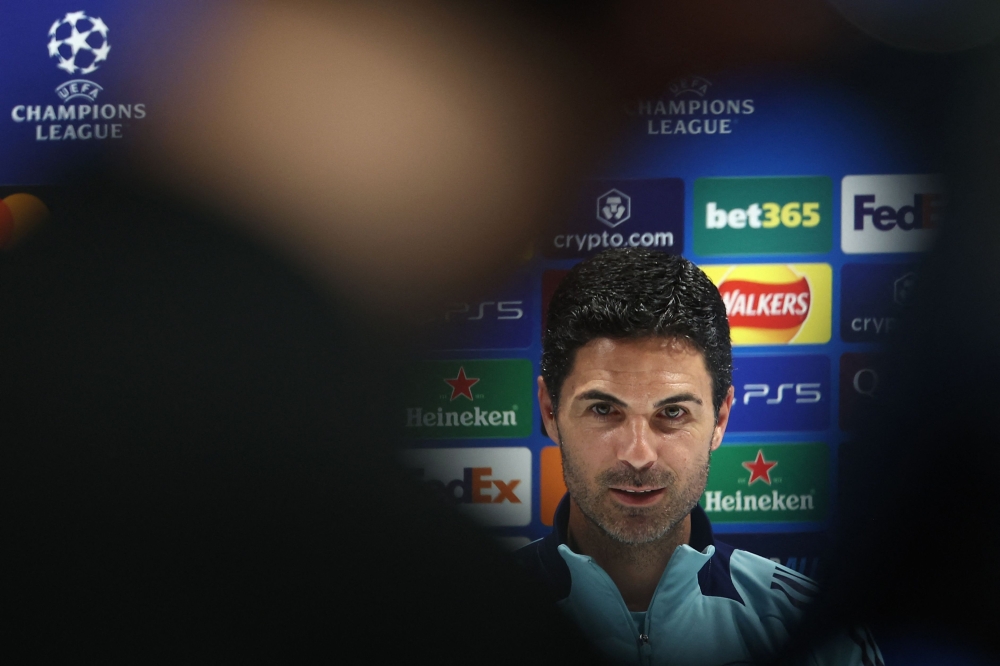 Mikel Arteta says seeing Liverpool win the Premier League has been ‘painful’ after Arsenal fell short in the title race for a third successive season. — AFP pic