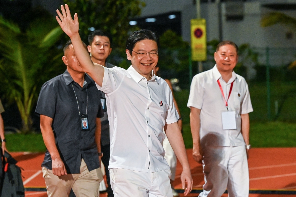 Voters have handed Singapore’s long-time ruling party a landslide election victory, offering Prime Minister Lawrence Wong a clear mandate to navigate the trade-orientated Southeast Asian nation through economic upheaval sparked by looming US tariffs. — AFP pic