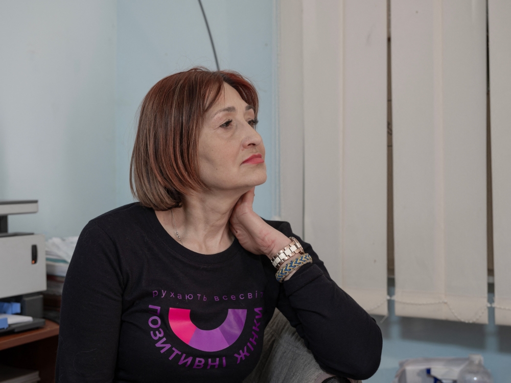 Natalia Zelenina, 52, poses for a portrait in the office of the Svitanok charitable foundation, where she works as a social worker after spending five years in Russian custody. — AFP pic