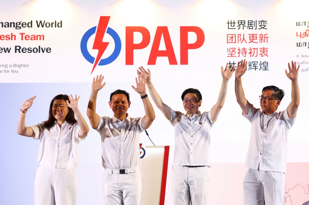 Singapore Prime Minister Lawrence Wong said the convincing re-election of his People’s Action Party would help the city-state face turbulent times. — Reuters pic