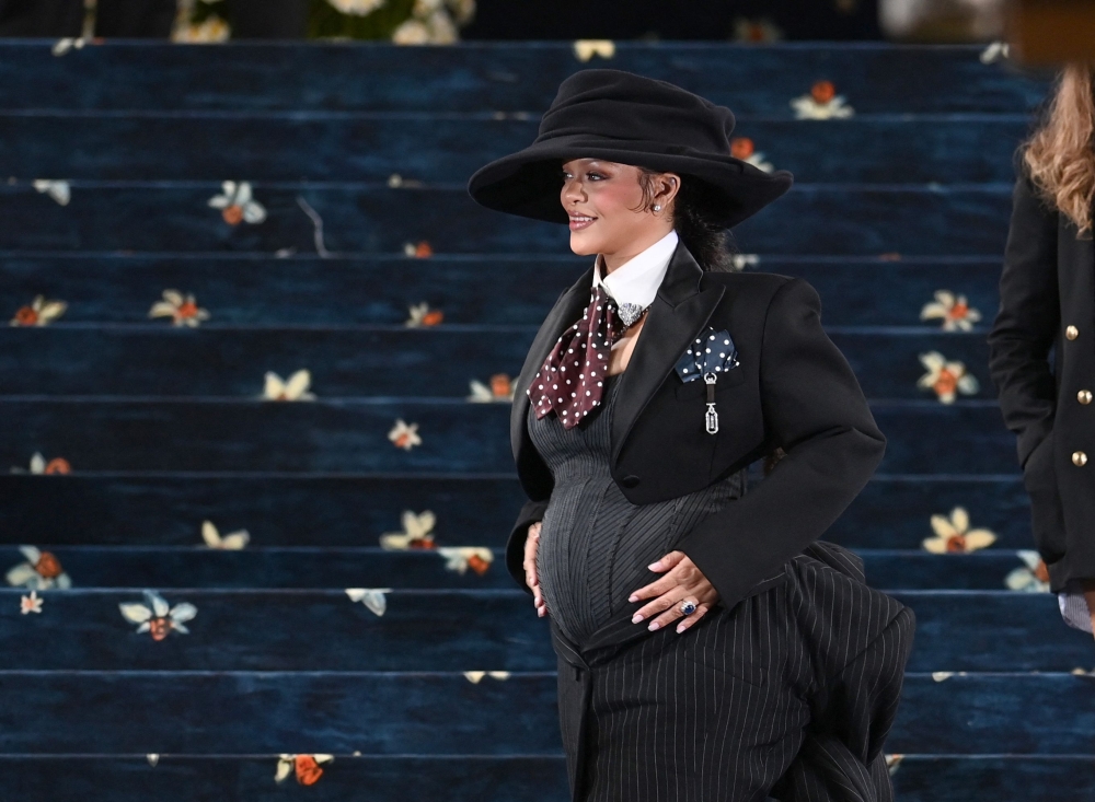 Barbadian singer and actress Rihanna shows off her baby bump at the 2025 Met Gala at the Metropolitan Museum of Art on May 5, 2025, in New York, US. — AFP pic